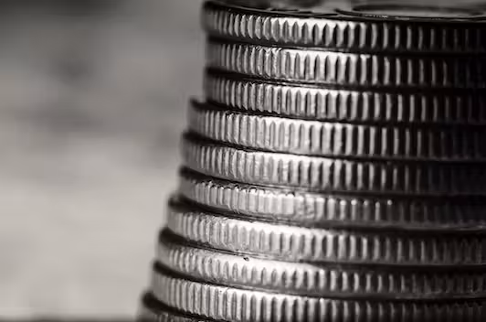Grey Coins Stacked